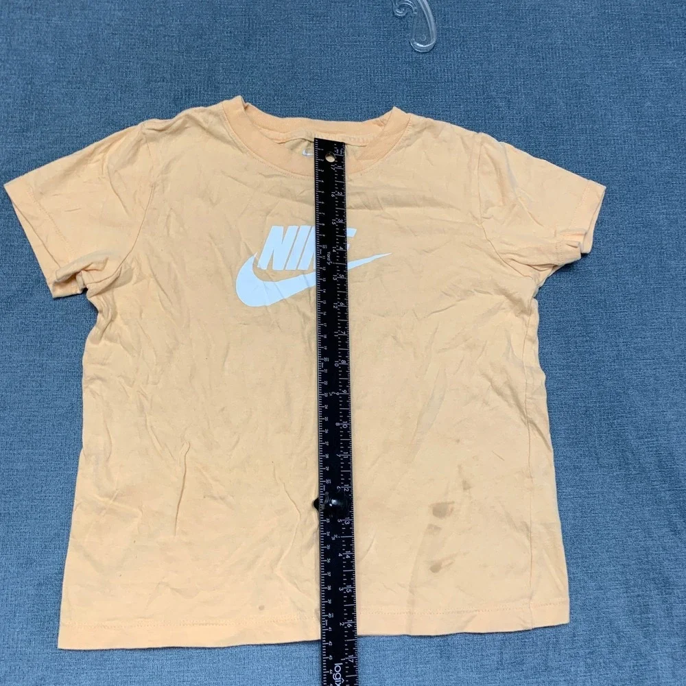 The Nike T Shirt Womens Small Peach Swoosh Logo Crew Neck Short Sleeve Pullover